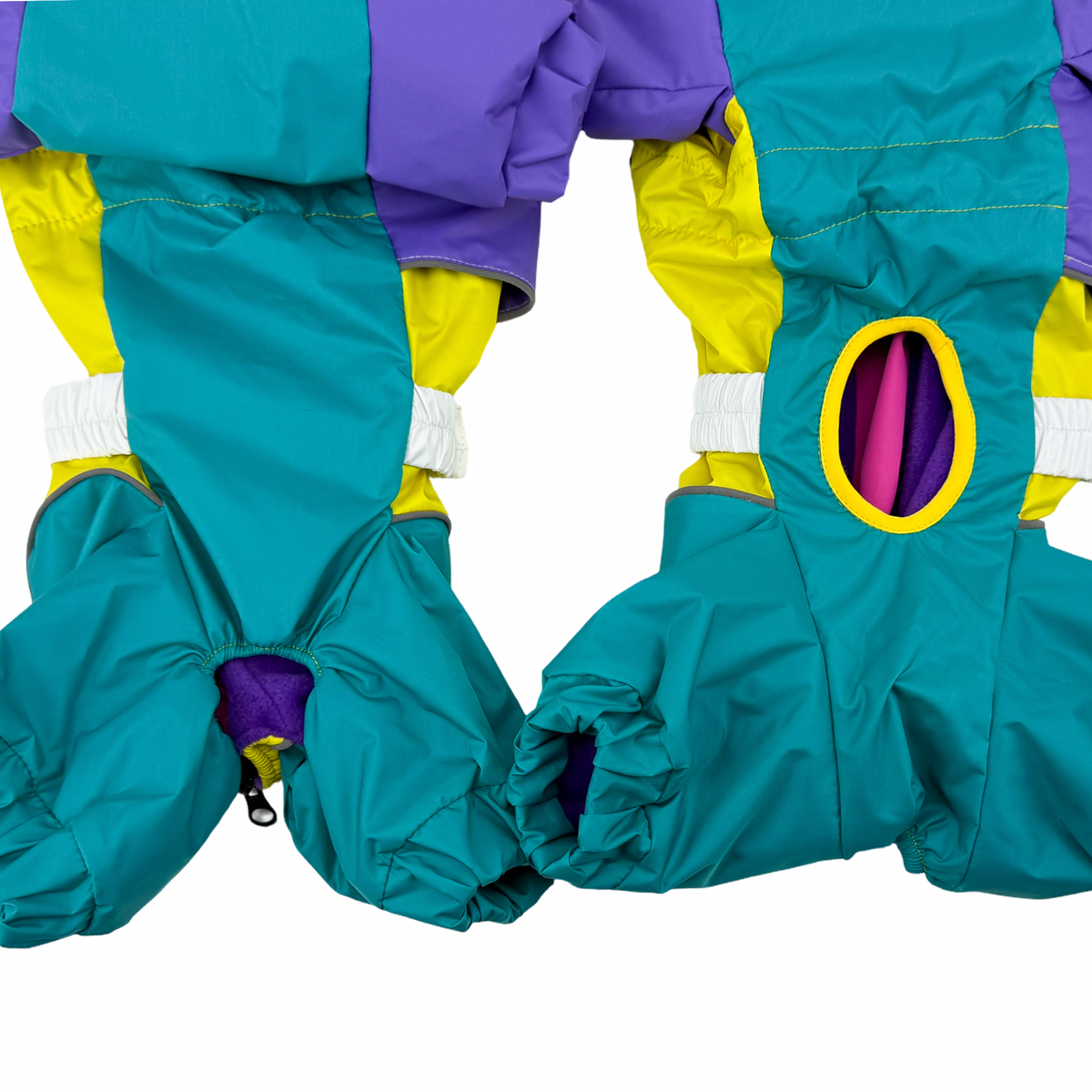 Close-up of the rear of the Rewind raincoat with elasticated cuffs and the harness opening